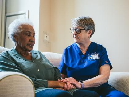 An image of a Woman and Health Aide